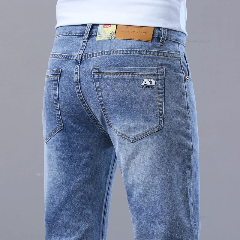 Pantalones vaqueros ajustados azul claro de primavera para hombre, pantalones vaqueros de tela elástica informales con estilo, pantalones clásicos gris humo - Imagen 2